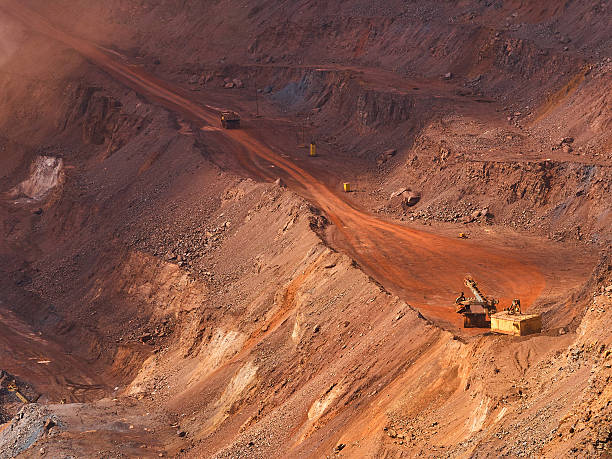 istock Iron ore production in red quarry 522749464