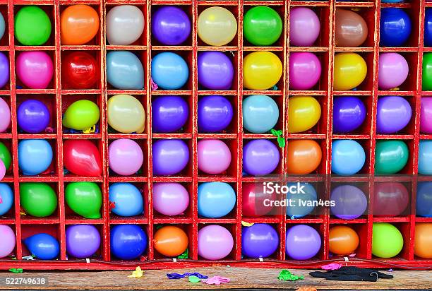 Wall Of Balloons Some Popped Carnival Dart Game Stock Photo - Download Image Now - Aiming, Arts Culture and Entertainment, Box - Container