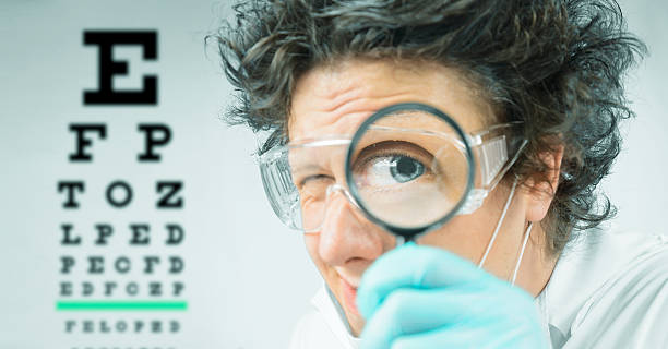 Funny doctor ophthalmologist stock photo