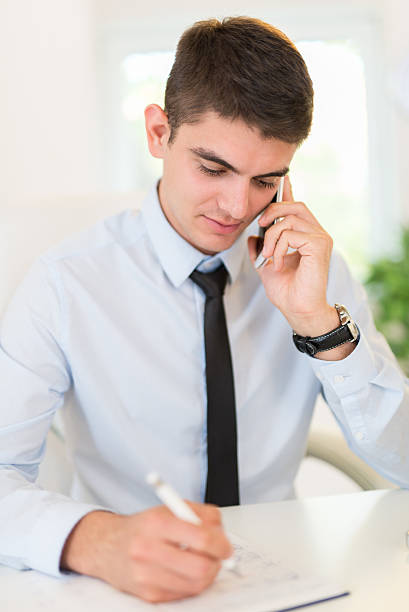 istock Businessman Phoning In Office 522750416