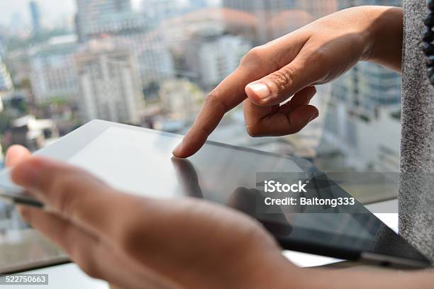 Touching Screen Of A Tablet Computer Stock Photo - Download Image Now - Arts Culture and Entertainment, Blank, Blue-collar Worker