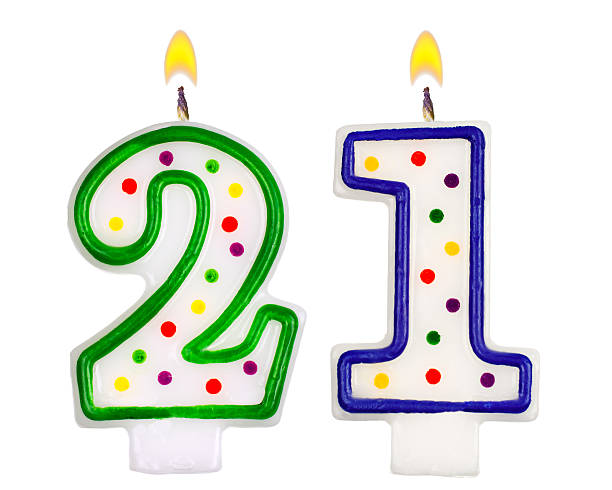istock Birthday candles number twenty one isolated on white background 522752263