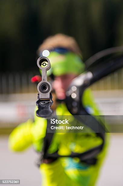 Young Biathlon Competitor At Target Shooting Stock Photo - Download Image Now - Accuracy, Activity, Adult