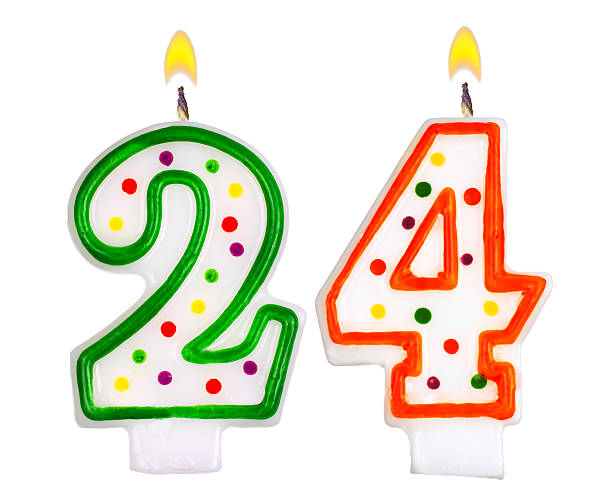 istock Birthday candles number twenty four isolated on white background 522752513