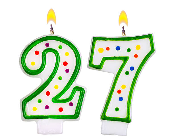 istock Birthday candles number twenty seven isolated on white 522752727