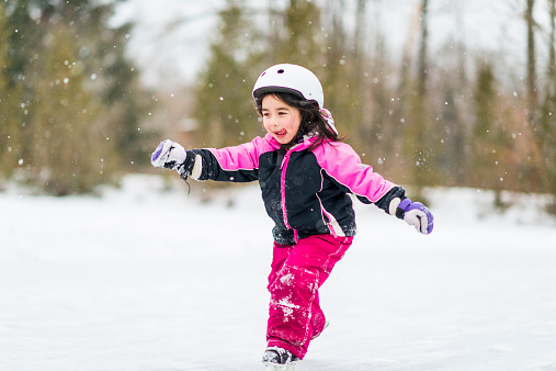 Kids playing outside in winter.