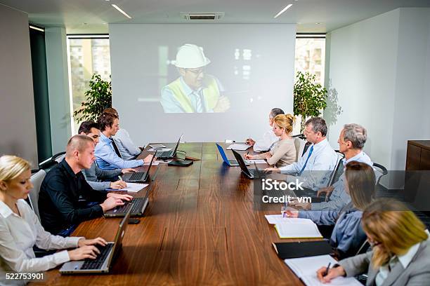 Participating In A Video Conference Stock Photo - Download Image Now - Helmet, Video Call, Video Still