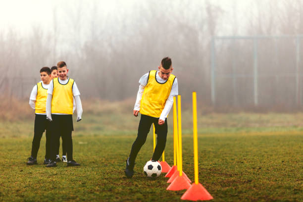 istock Kids Training Soccer Dribbling. 522754172