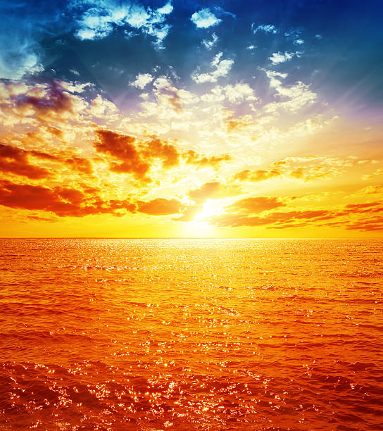 istock good orange sunset over sea 522755455