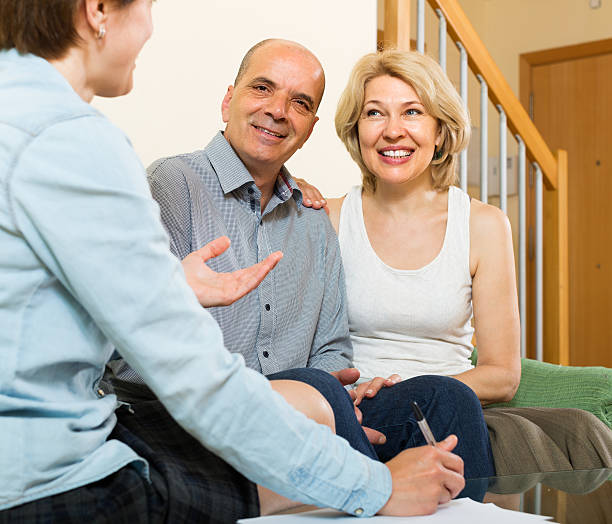 istock Mature couple filling questionnaire 522761665