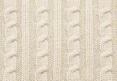 Warm beige cable knit close-up