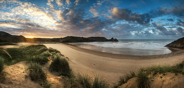 istock Beautiful Summer sunrise landscape over yellow sandy beach 522764269