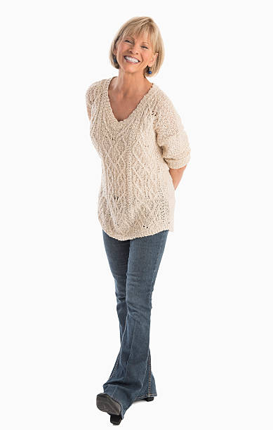 istock Woman With Hand Behind Back Walking Over White Background 522765243