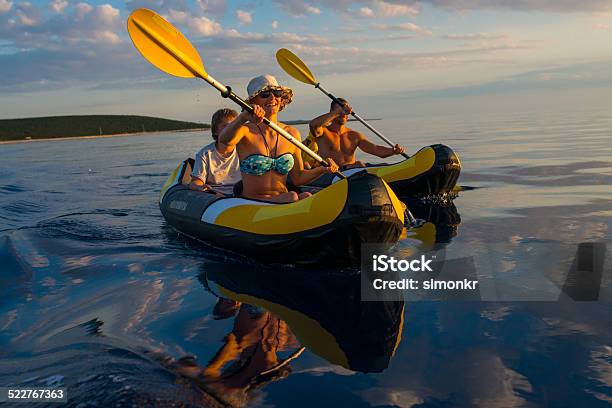 Family Having Fun Sea Kayaking Stock Photo - Download Image Now - Active Lifestyle, Activity, Adventure