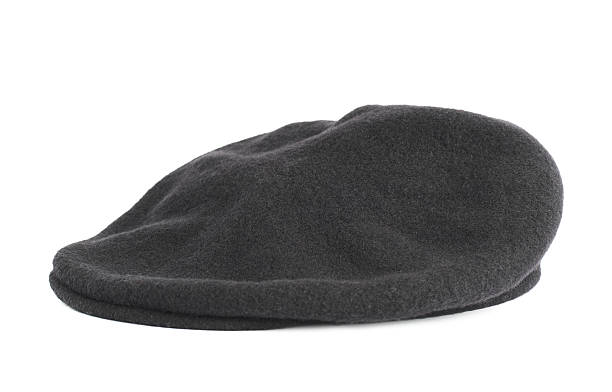 istock Black woven beret flat-crowned hat isolated 522775884