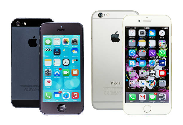 a photography of a person holding a cell phone in their hand, someone holding a white cell phone in their hand.