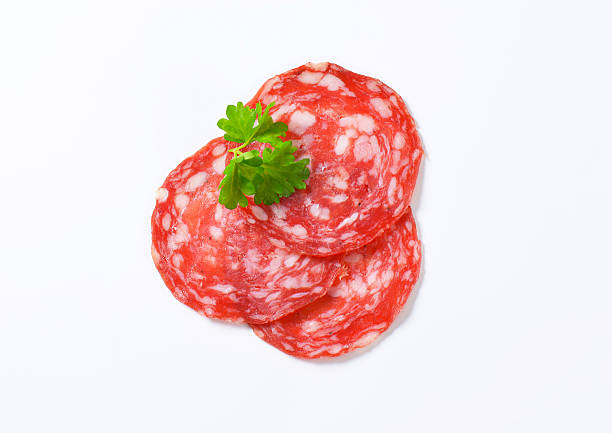 Iberian salchichon Spanish summer sausage made with Iberico pork - thin slices salami stock pictures, royalty-free photos & images