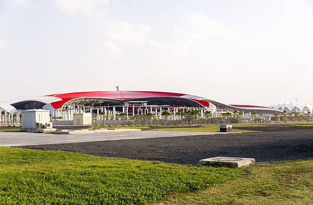 Abu Dhabi, United Arab Emirates - December 11, 2013: Ferrari World building details with roller coaster.