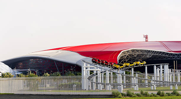 Abu Dhabi, United Arab Emirates - December 11, 2013: Ferrari World building details with roller coaster.