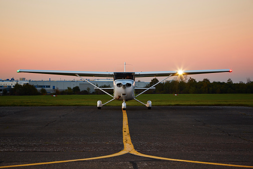 Young pilot is preparing for take off with private plane