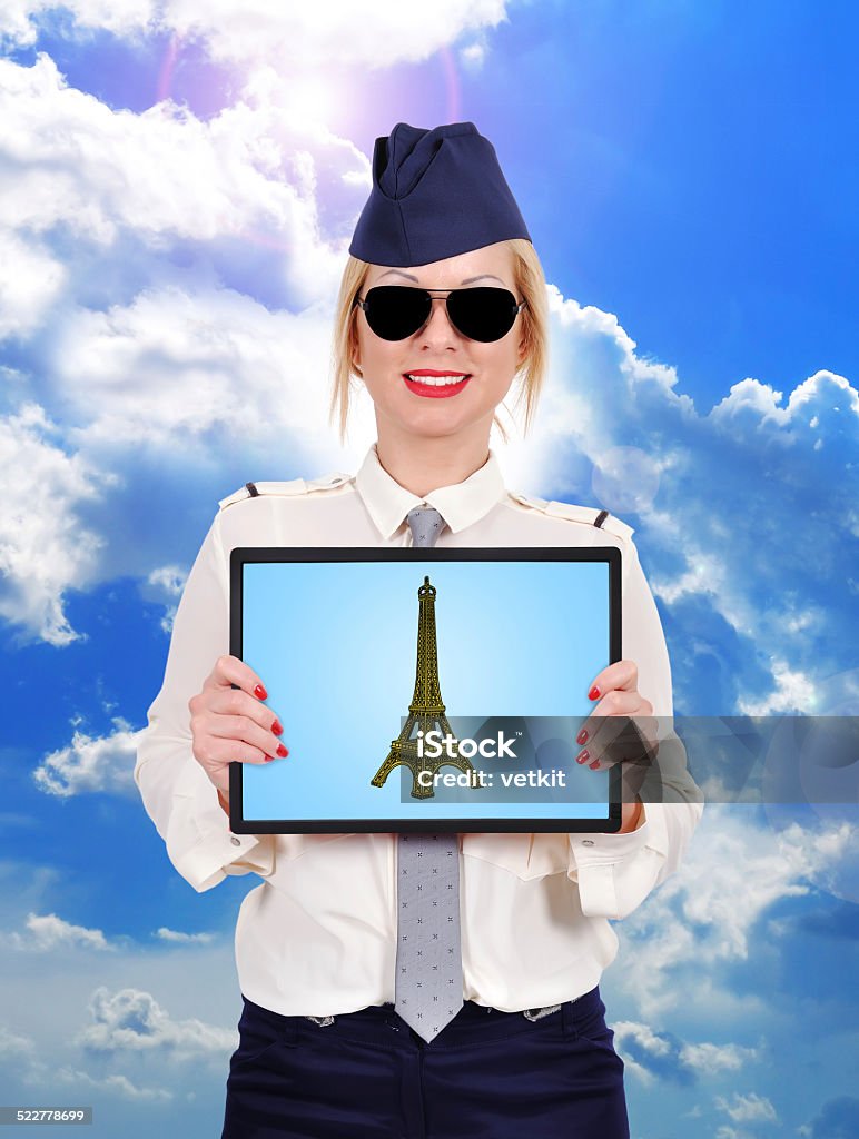 tablet with eiffel tower stewardess holding tablet with eiffel tower Adult Stock Photo