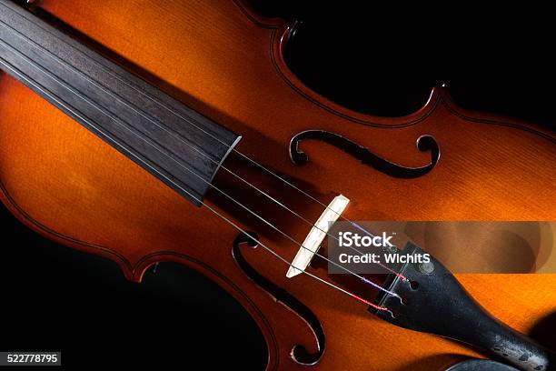 Isolated Violin On Black Background Stock Photo - Download Image Now - Antique, Bass Instrument, Black Color