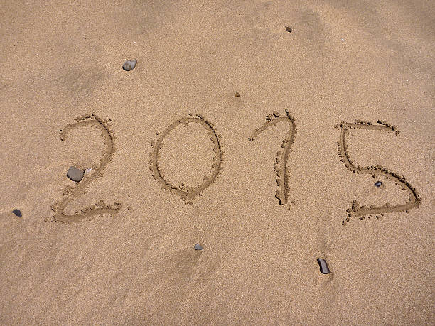 istock new 2015 year numbers drawings in the sand 522779091