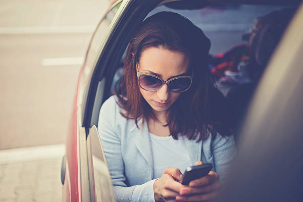 istock Woman in taxi 522779450