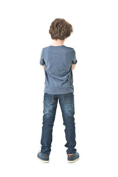 full body portrait of 8 years old boy picture of curly 8 years old boy isolated on white. Full length. Back view. ass boy stock pictures, royalty-free photos & images