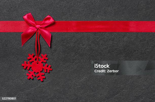 Slate Board With A Felt Snowflake Stock Photo - Download Image Now - Advent, Black Background, Black Color