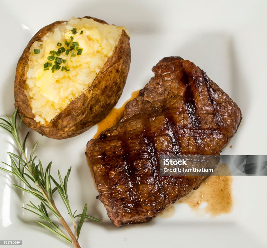 grilled sirloin steak grilled sirloin steak dinner with baked potato Baked Potato Stock Photo