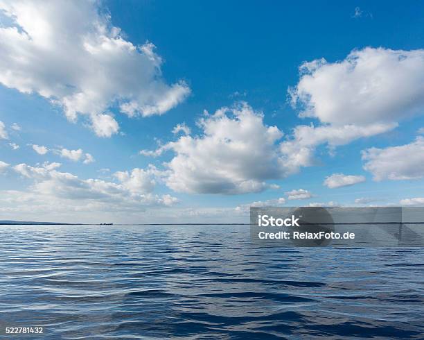 Majestic Cloudscape Over Lake Blue Sky White Clouds Stock Photo - Download Image Now
