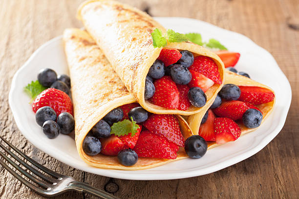 istock pancakes with strawberry blueberry 522782061
