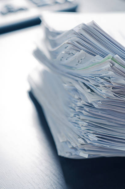 istock Stacks of paper on the office table 522783149