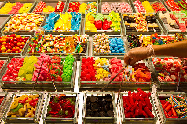 Sweets and candies Colourful sweets and candies at Boqueria market in Barcelona pick and mix stock pictures, royalty-free photos & images