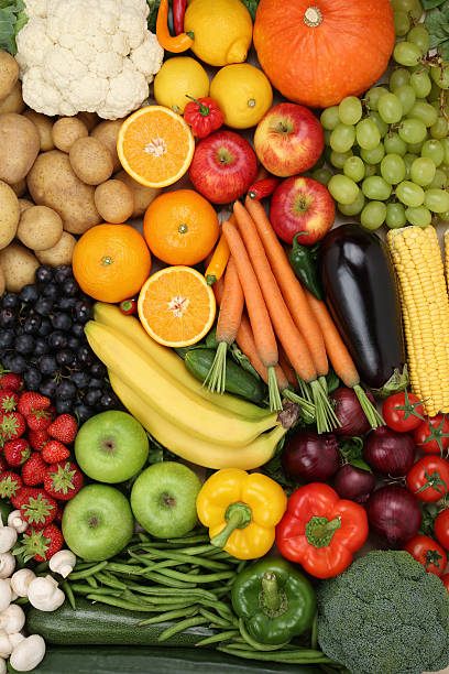 istock Vegetarian fruits and vegetables like apple, orange background 522783399