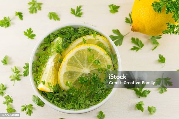 Water With Parsley And Lemon Stock Photo - Download Image Now - Parsley, Lemon - Fruit, Tea - Hot Drink