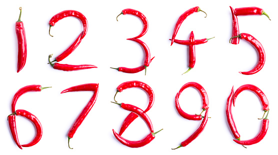 numbers made from red chili peppers; isolated on white background