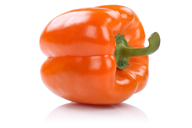 istock Orange paprika vegetable isolated on white 522785944