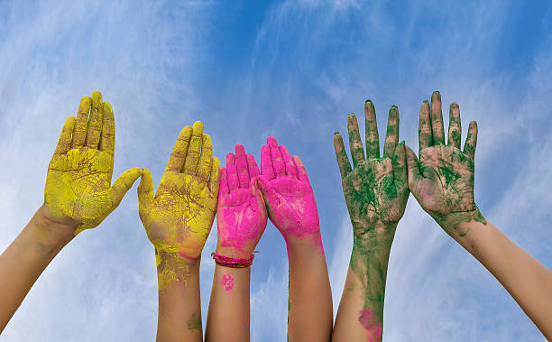 istock Young people hands covered in Holi Colors isolated 522788396