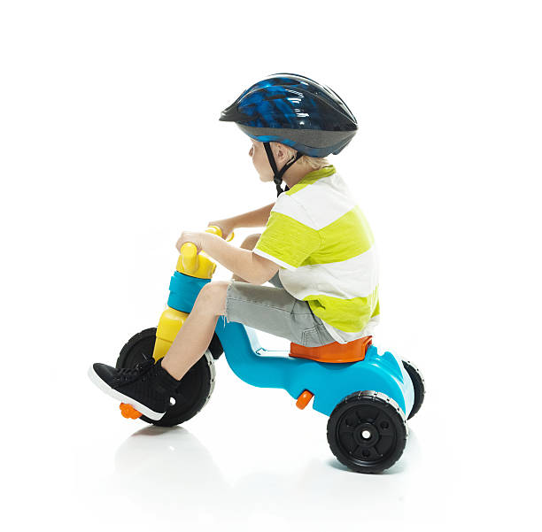istock Little boy riding tricycle 522789754