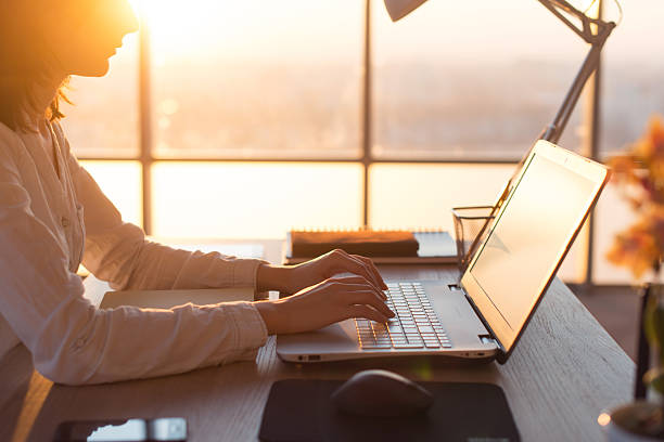 istock Female teleworker texting using laptop and internet, working online. Freelancer 522790584