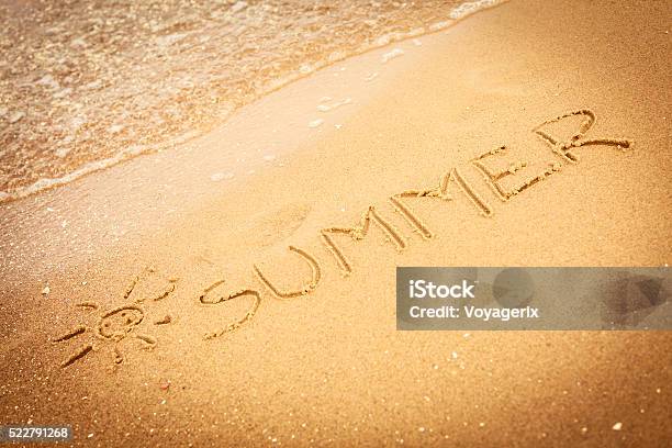 The Word Summer Written In The Sand On A Beach Stock Photo - Download Image Now - Beach, Coastline, Handwriting