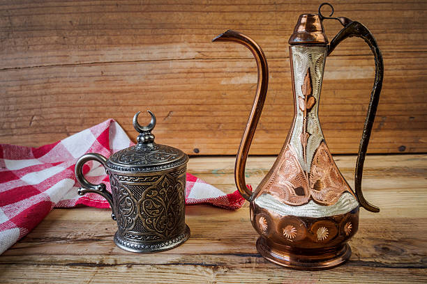 istock Turkish teapot with arabic decoration with metal cup and dish 522794734