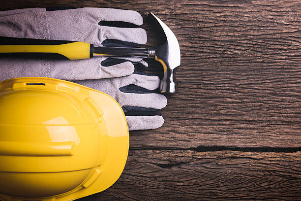 istock Safety equipment and tool kit on wooden background 522795150