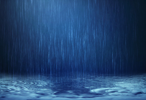 The rain water drop falling to the floor in rainy season