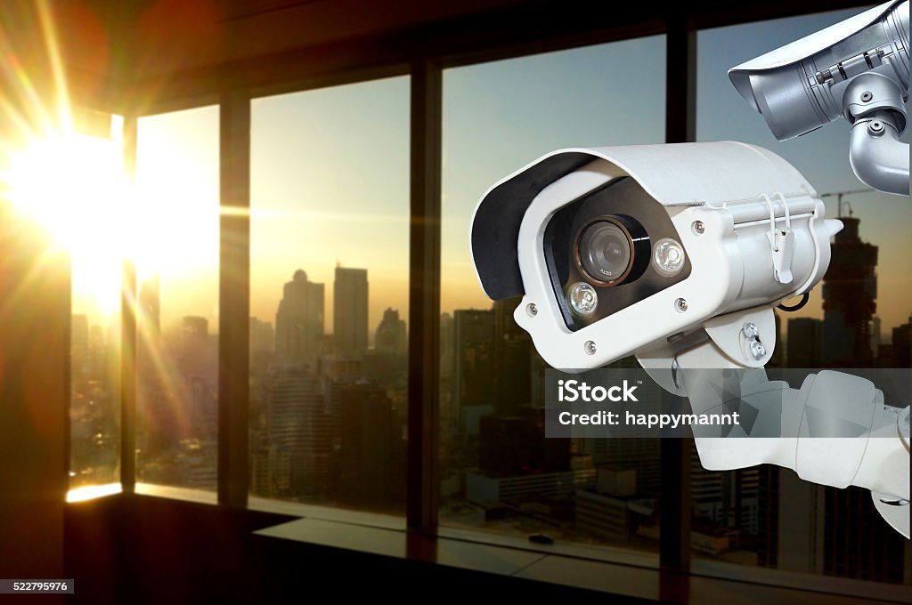 Camera Behind Window Cctv Camera Operating Inside Office Window Stock Photo - Download Image ...