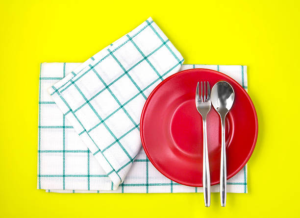 istock top view of empty  red dish and towel 522797458