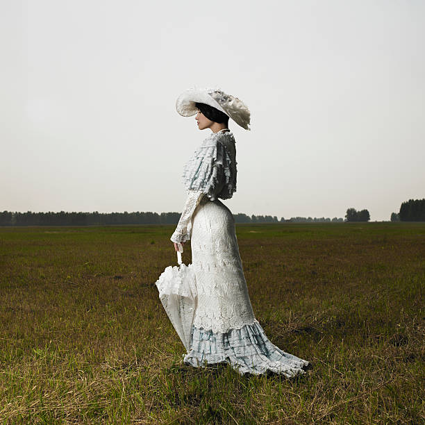 Woman in vintage dress stock photo