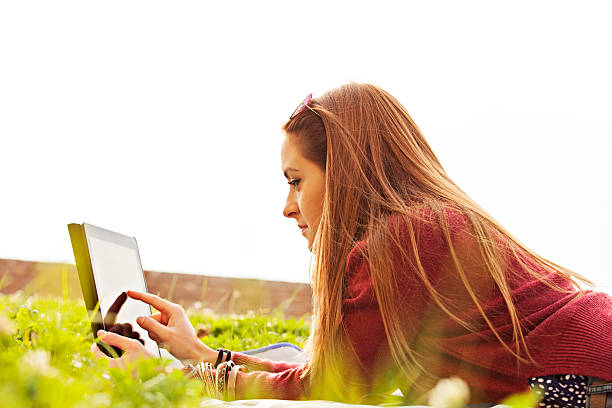 istock Young woman with digital tablet 522798615